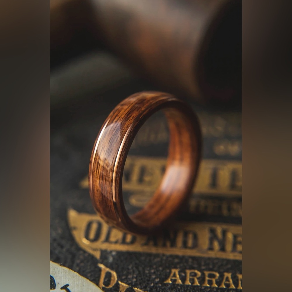 Men’s wood & copper wedding band. Size 7 1/2, non-resizable. Unworn, new in box.